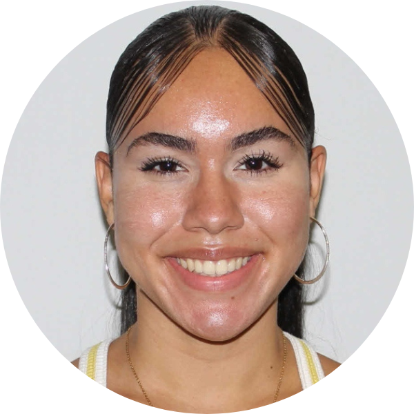 Woman smiling with white background.